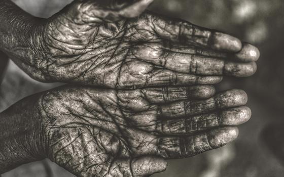 Empty elderly hands (Unsplash/Om Prakash Sethia)