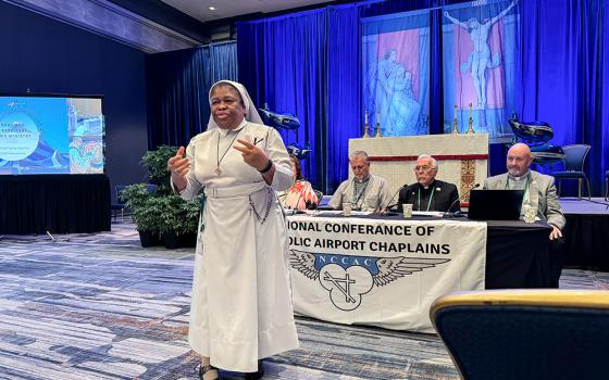 Sr. Joanna Okereke, assistant director of the U.S. Conference of Catholic Bishops’ Subcommittee on Pastoral Care of Migrants, Refugees and Travelers, speaks to a group of bishops Nov. 12, 2024, in Baltimore, about the different hidden communities the subcommittee works with. (GSR photo/ Rhina Guidos)