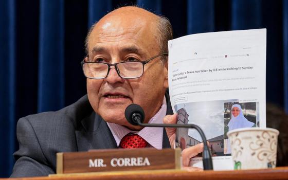 At a hearing on Capitol Hill in Washington June 30, 2026, Rep. Lou Correa, D-Calif. holds up a news article about Sr. Leticia Ugboaja, a member of the Daughters of Mary Mother of Mercy. (OSV News/Reuters/Kylie Cooper)