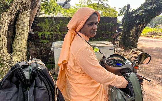 Good Samaritan Sr. Jaya Anto Mangalath brings food and essential supplies to women living on the streets of Kanhangad town in the southwestern Indian state of Kerala. (Courtesy of Jaya Anto Mangalath)