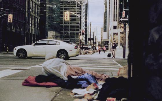 Unhoused person on street