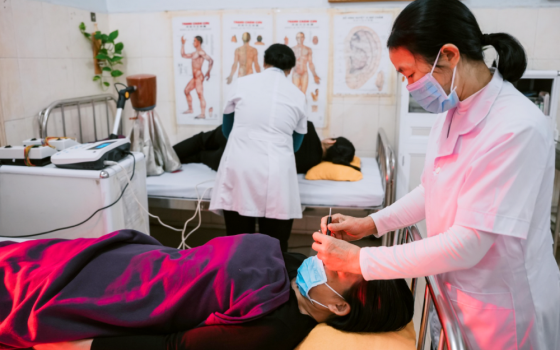 Sr. Anna Huynh Thi Binh receives treatment at Hue Traditional Medicine Hospital on May 23, 2026. (Joachim Pham)