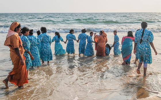 Children from the Infant Jesus Children's Home and Dinasevanasabha nuns enjoy a beach in Mangaluru, southern India, with the Dinasevanasabha (Servants of the Poor) nuns. (Thomas Scaria)