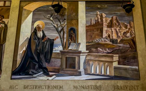 A fresco in the cell of St. Benedict at the Monastery of Monte Cassino in Italy depicts Benedict weeping after foreseeing the destruction of the monastery. The Latin inscription reads, "Here he foresaw and wept over the destruction of the monastery." (GSR photo/Helga Leija)
