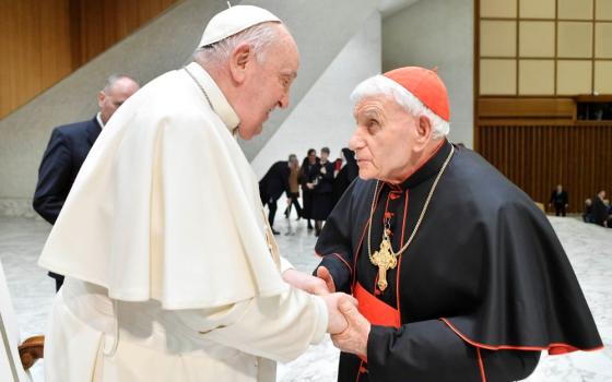 Pope Francis greets Albanian Cardinal Ernest Simoni at the end of his weekly general audience in the Paul VI Audience Hall at the Vatican Feb. 14, 2024. (CNS/Vatican Media)