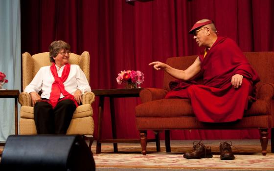 St. Joseph Sr. Helen Prejean spoke with His Holiness the Dalai Lama in a panel discussion that included Prof. Vincent Harding at the University of Arkansas, Fayetteville, May 11, 2011. (Courtesy of Ministry Against the Death Penalty)