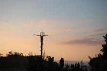 A sculpture representing Moses' staff and the serpent is seen on Mount Nebo Oct. 9, 2017. at sunset in Jordan. Mount Nebo is the place where Moses is said to have seen the Promised Land and died. (CNS/James Ramos, Texas Catholic Herald)