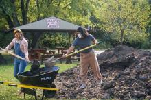 People work on a garden at Sacred Heart Parish Mission in the Diocese of Joliet, Ill. The food grown is distributed to people in need of food assistance in the community. (CNS/Courtesy of Joliet Diocese)